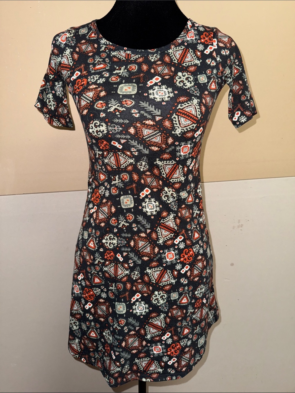 LuLaRoe Adeline Black Dress with Orange & Cream Geometric Print for Kids